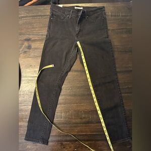 Levi 311 shaping skinny black jeans.